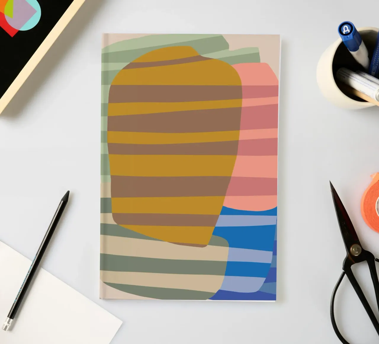 Stripe pattern layering notebook by Little Dean