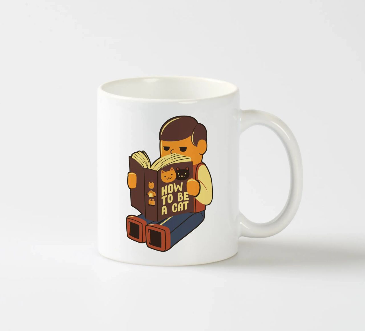 How to be a cat tazza in ceramica da Tobe Fonseca