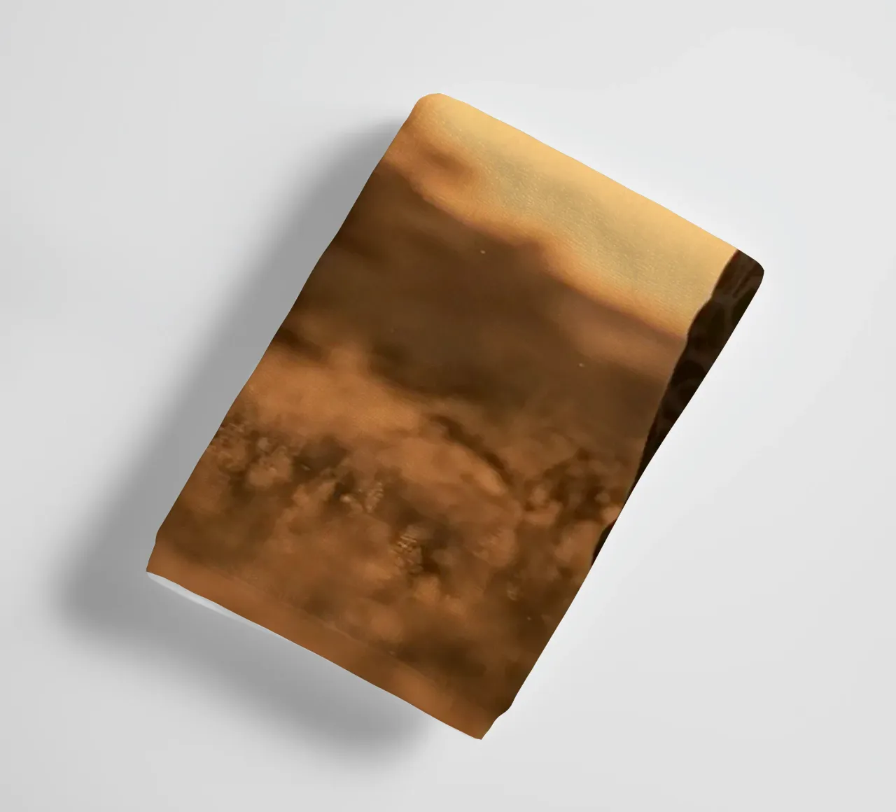 A giraffe standing on the meadow in the afternoon towel by Earthly Visions