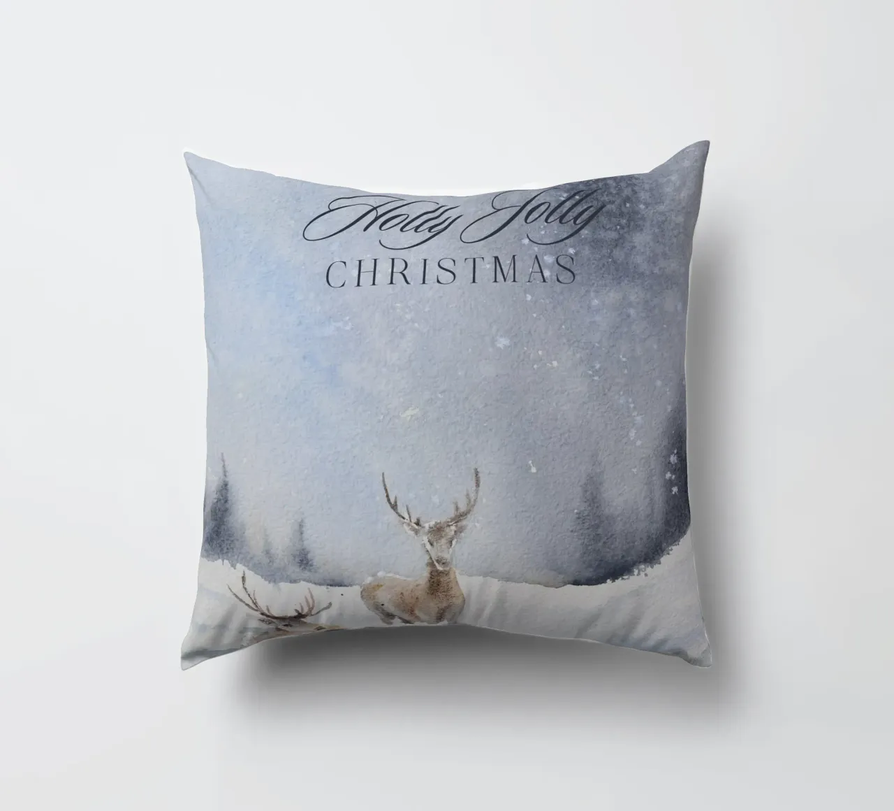 Renne in un bosco invernale con la scritta Have a Holly Jolly Chr cuscino da Studio Vibe