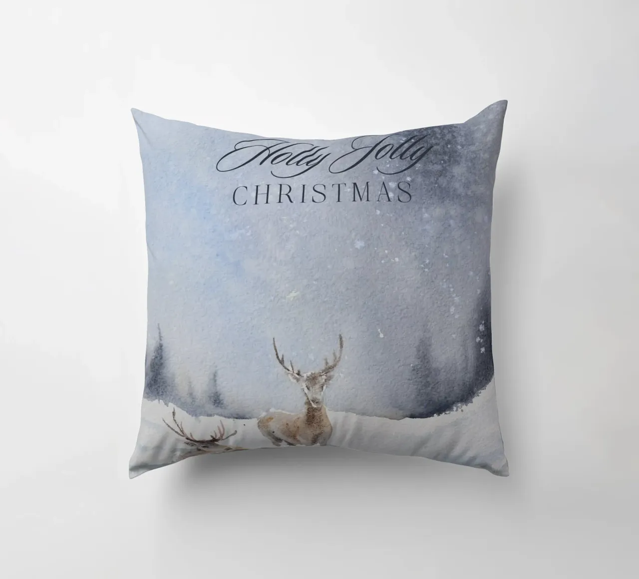 Renne in un bosco invernale con la scritta Have a Holly Jolly Chr cuscino da Studio Vibe