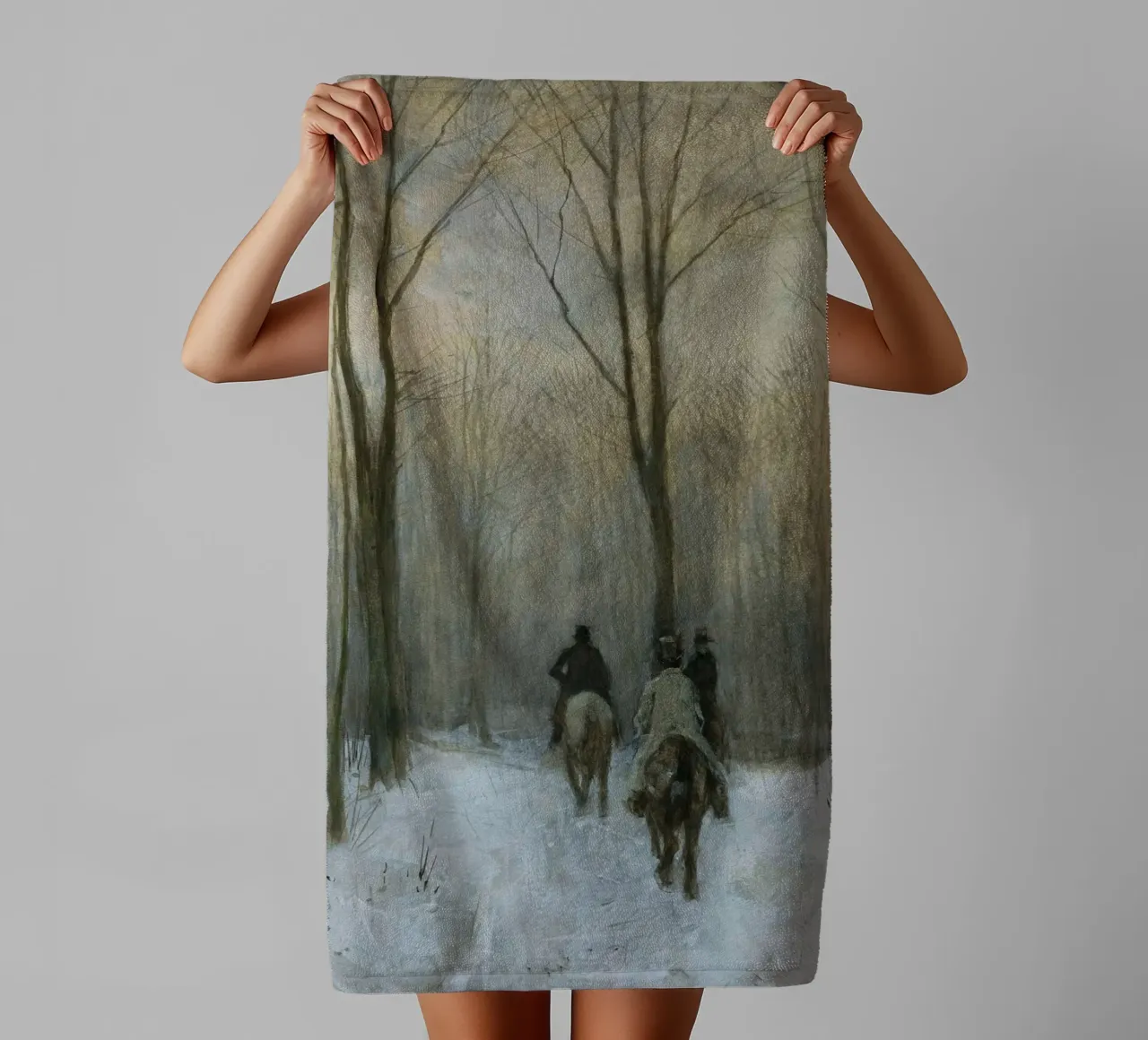 Three riders in a snowy winter forest under bare trees towel by Studio Vibe