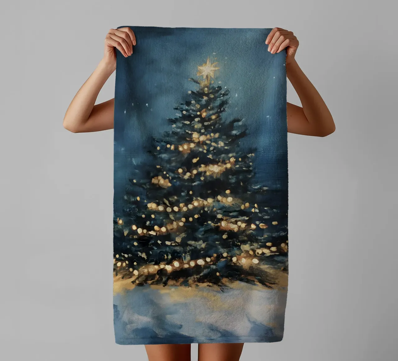 Glowing Christmas tree in the snow with a twinkling star towel by Studio Vibe