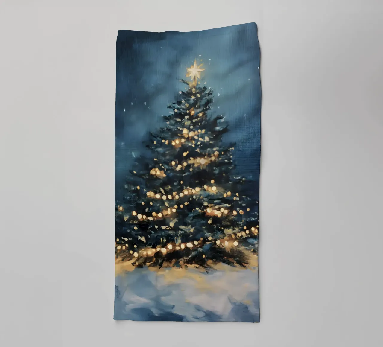Glowing Christmas tree in the snow with a twinkling star towel by Studio Vibe