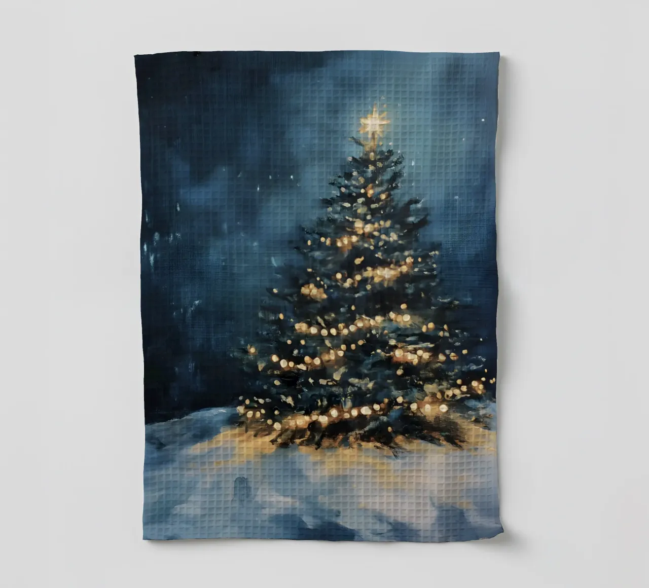 Sapin de Noël lumineux dans la neige avec étoile scintillante torchon de Studio Vibe