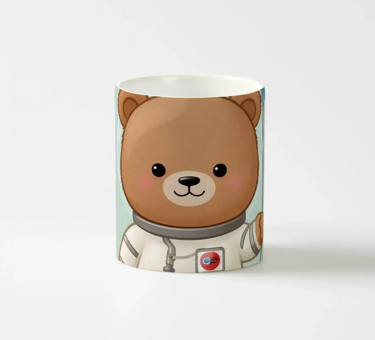 Orso astronauta dei cartoni animati con in mano un palloncino a forma di stella tazza in ceramica da DesignDoodle