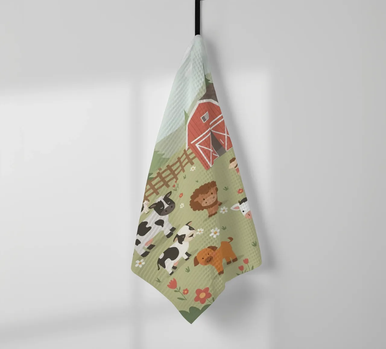 Animaux de ferme mignons dans un champ avec une grange torchon de DesignDoodle