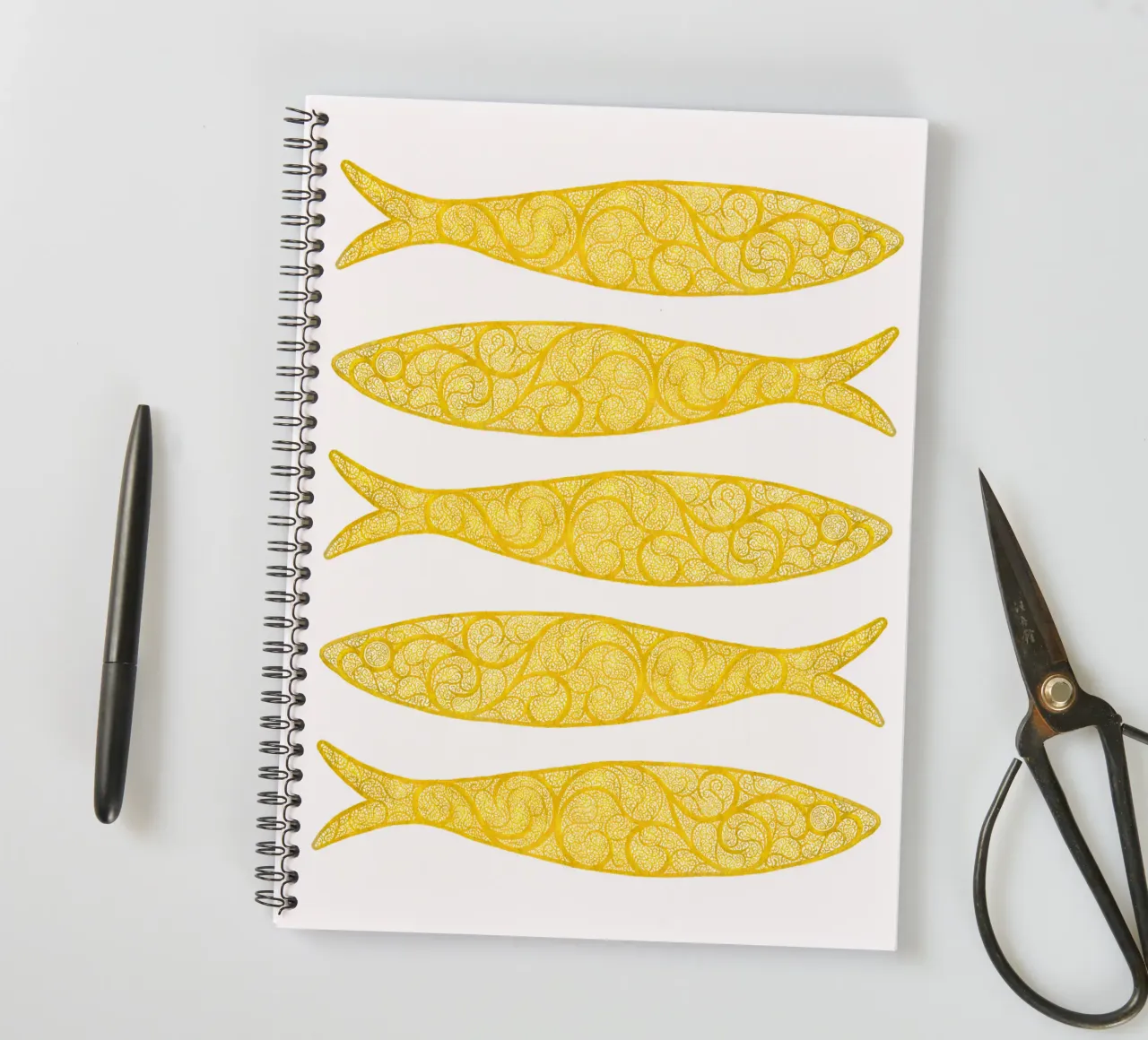Golden Sardines spiral notebook by Kuba Gornowicz