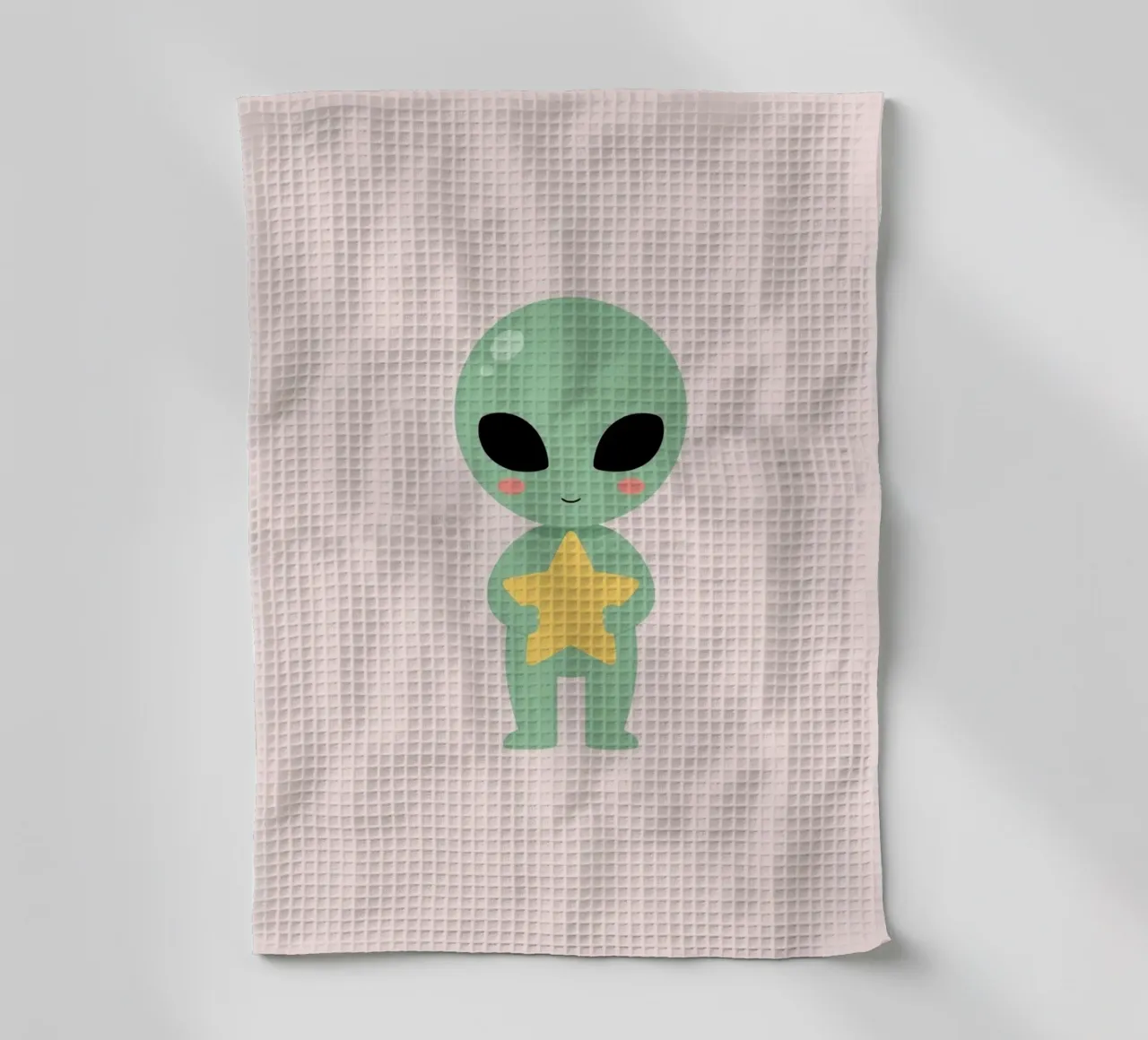 Mignon dessin animé Alien vert tenant une étoile jaune torchon de DesignDoodle