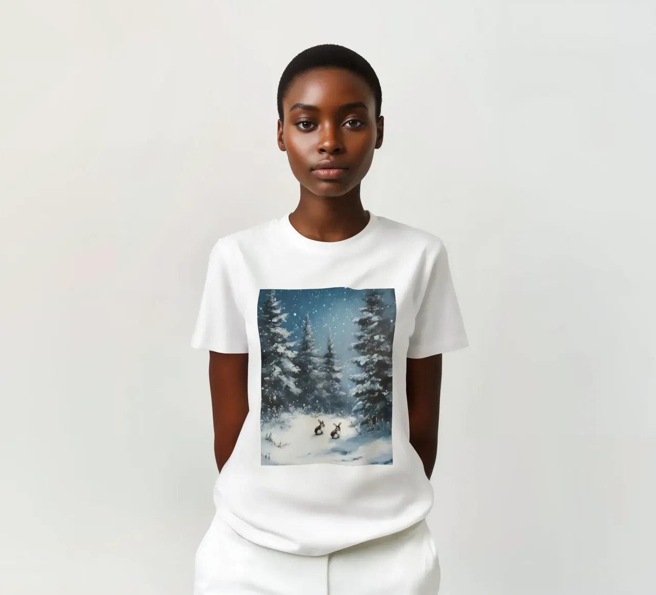 Poster invernale con lepri in una foresta innevata t-shirt da Studio Vibe