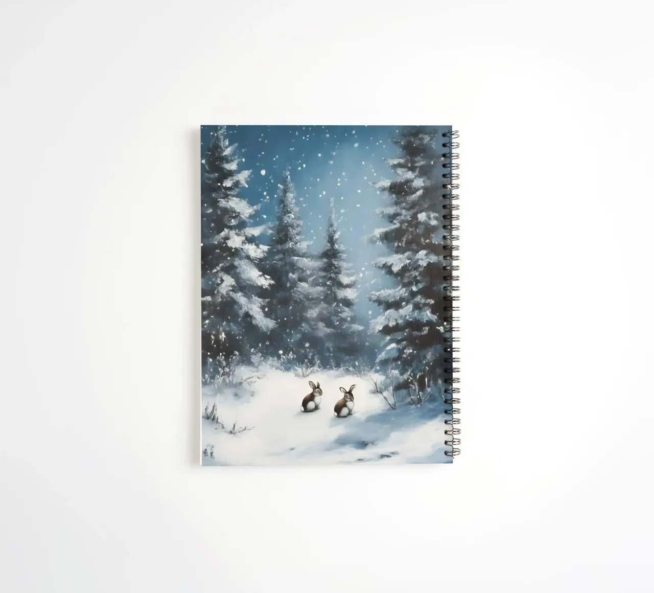 Poster invernale con lepri in una foresta innevata diario ad anelli da Studio Vibe
