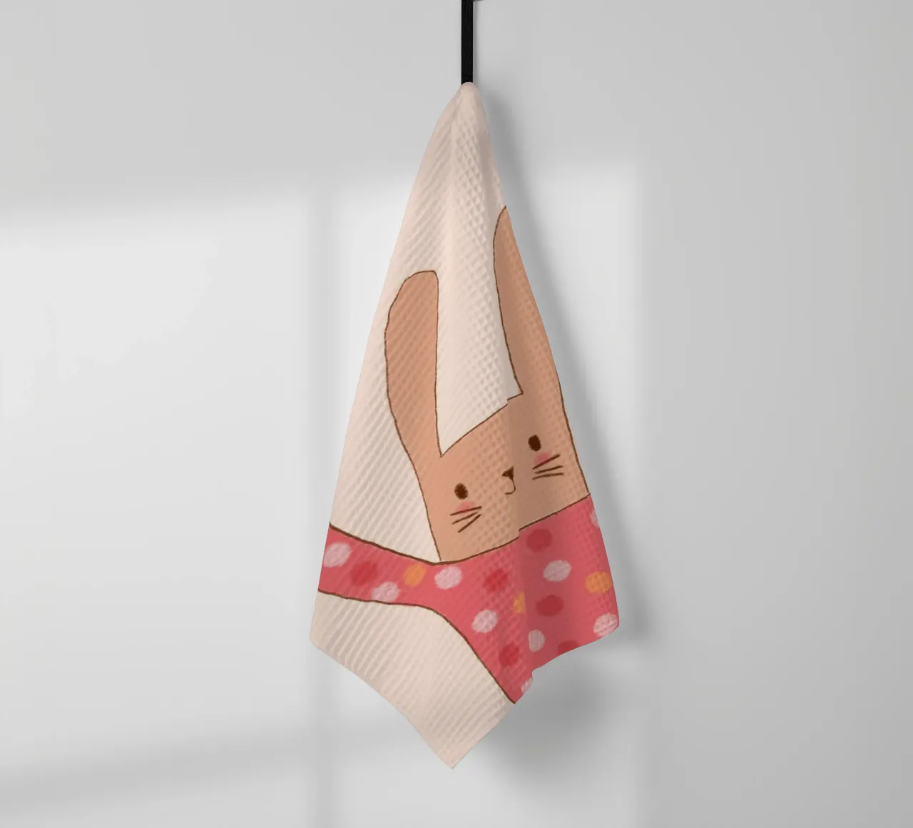 Lapin mignon faisant un signe de la main avec une chemise à pois torchon de vintagepod