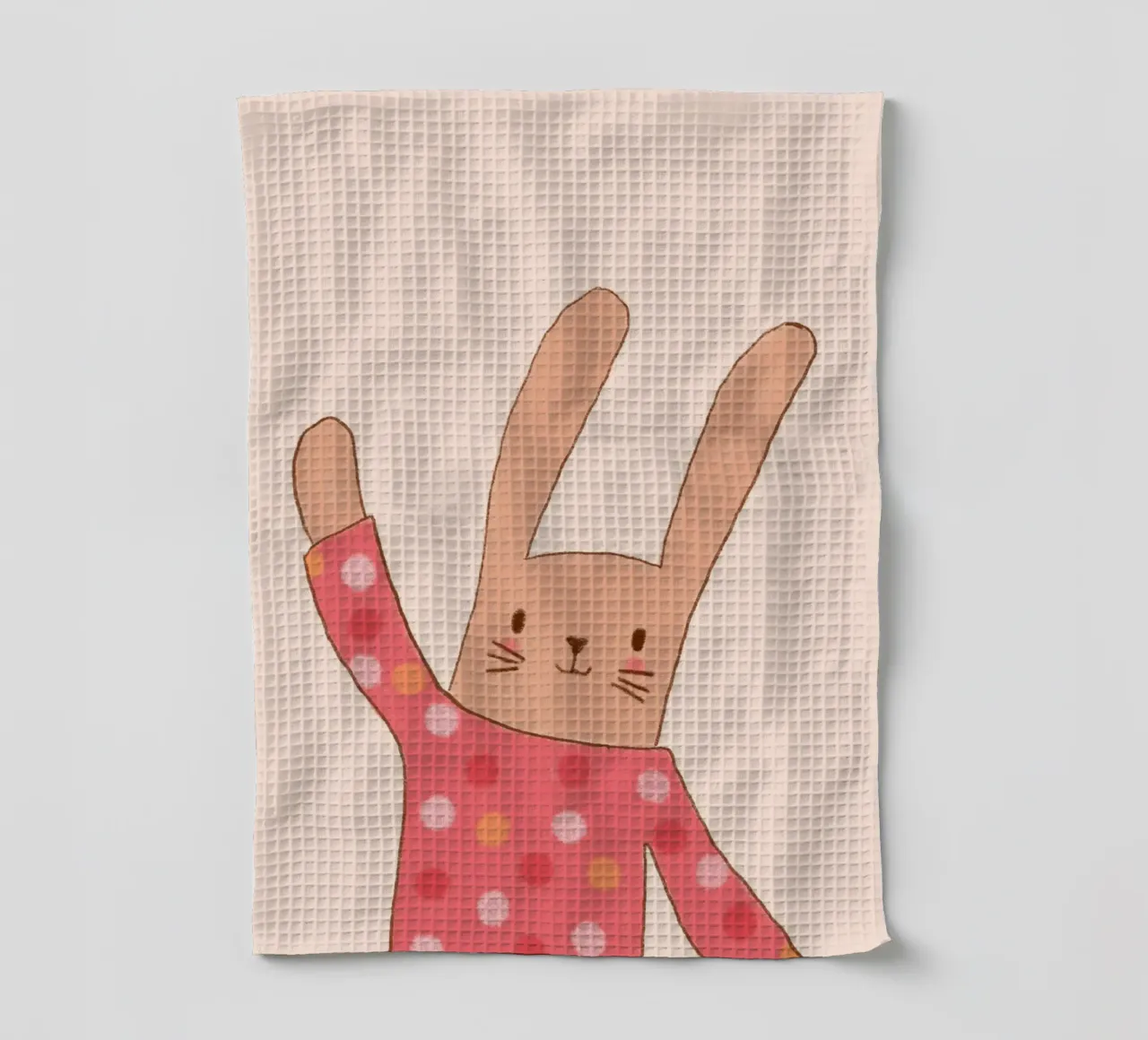 Lapin mignon faisant un signe de la main avec une chemise à pois torchon de vintagepod