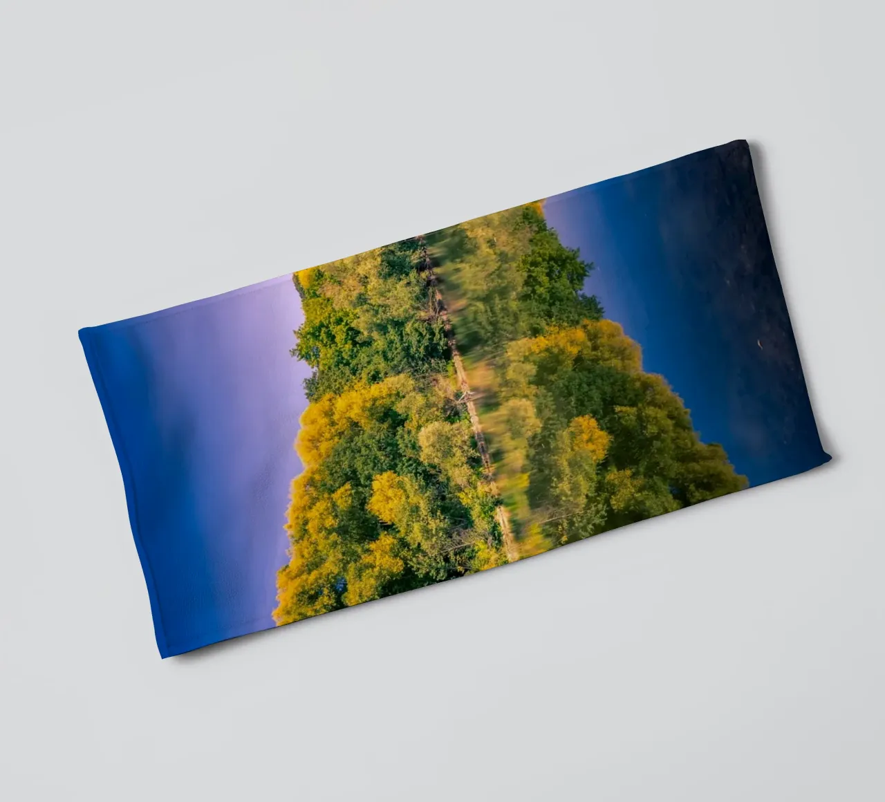 Reflection of trees in a small pond towel by Marcus Beckert | Fotografie