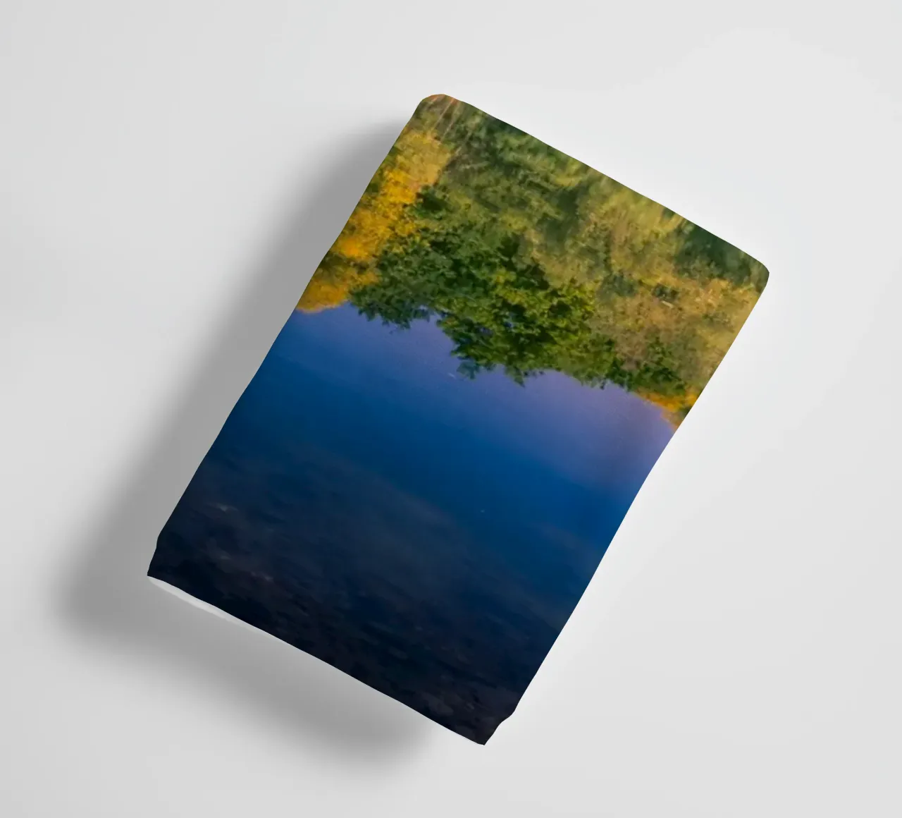 Reflection of trees in a small pond towel by Marcus Beckert | Fotografie