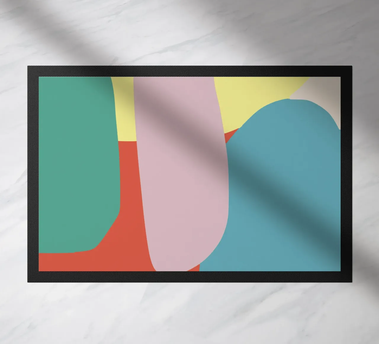 Colored pebble doormat by Little Dean