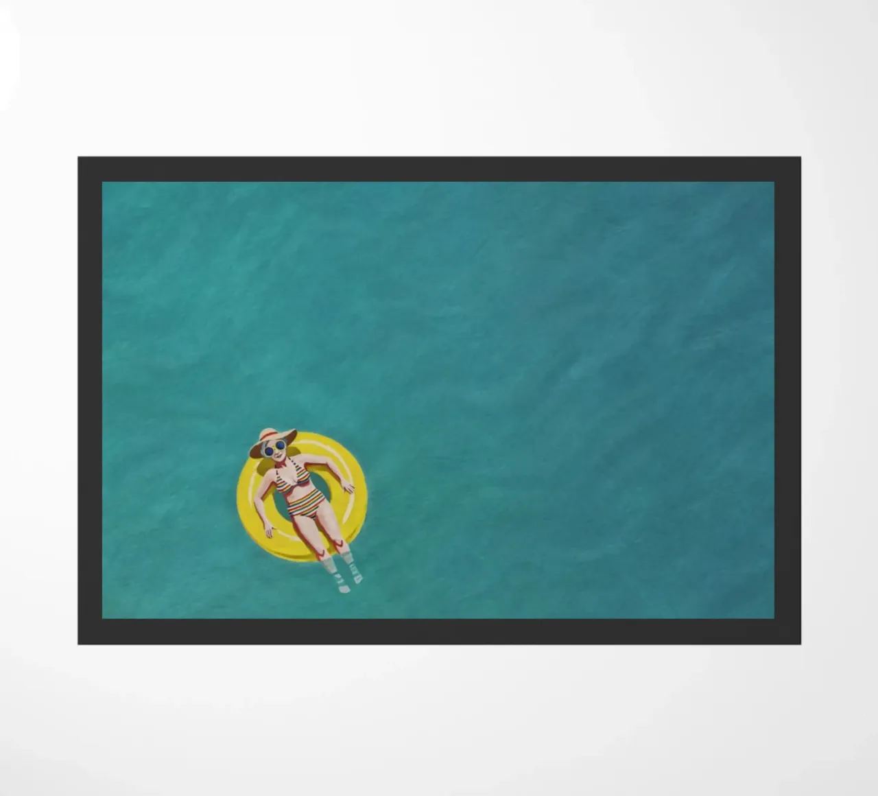 Nageur dérivant sur un beignet jaune, vue aérienne paillasson de Hecate Pim Designs