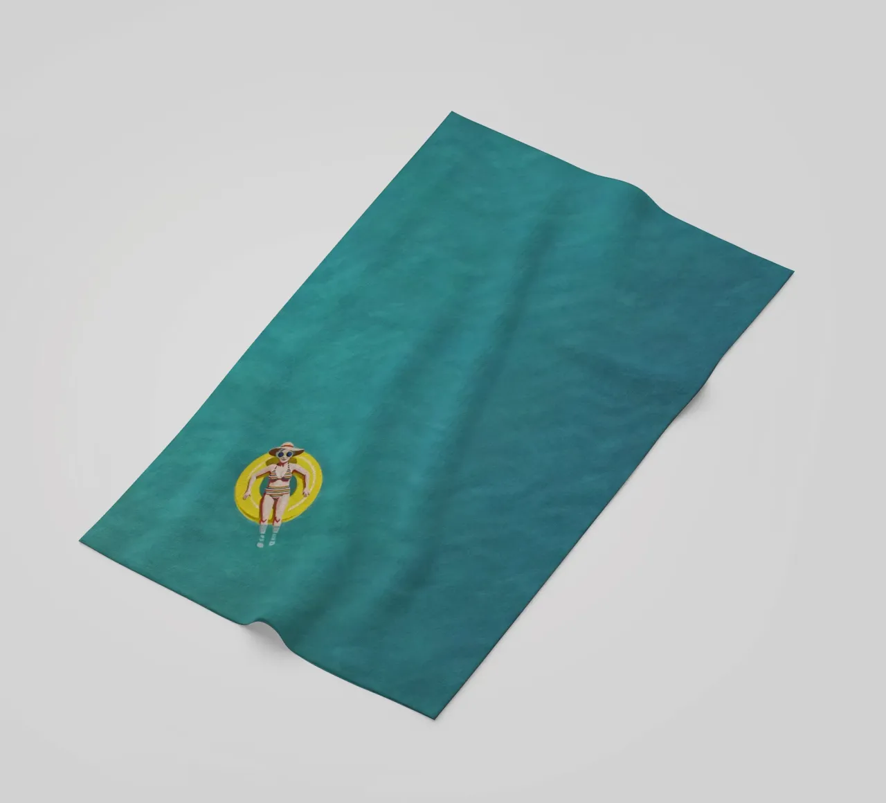 Nageur dérivant sur un beignet jaune, vue aérienne serviette de plage de Hecate Pim Designs
