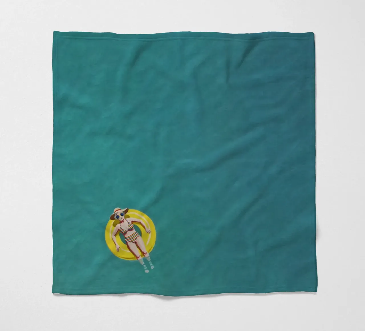 Nageur dérivant sur un beignet jaune, vue aérienne plaid polaire de Hecate Pim Designs