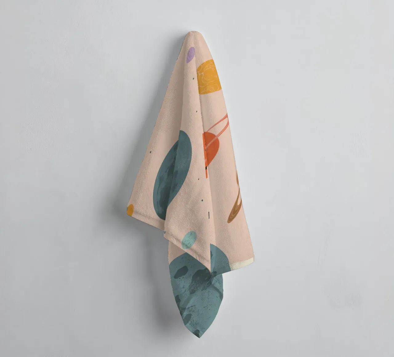 Planets with Rings and Stars on Peach Background towel by DesignDoodle