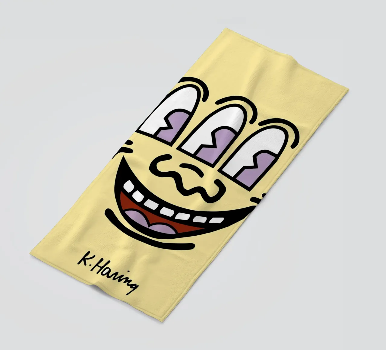 Stampa pop di Keith Haring con la faccia a tre occhi telo mare da ClubArt