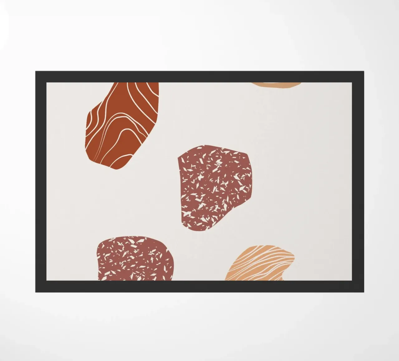 Pebble composition doormat by Little Dean