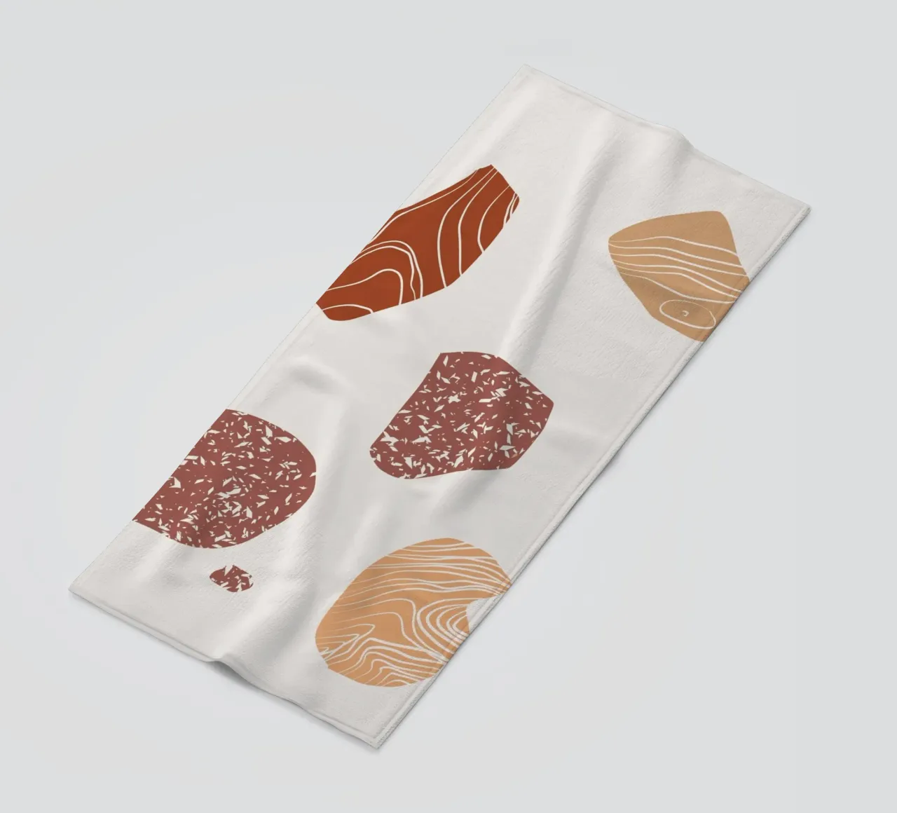 Pebble composition beach towel by Little Dean