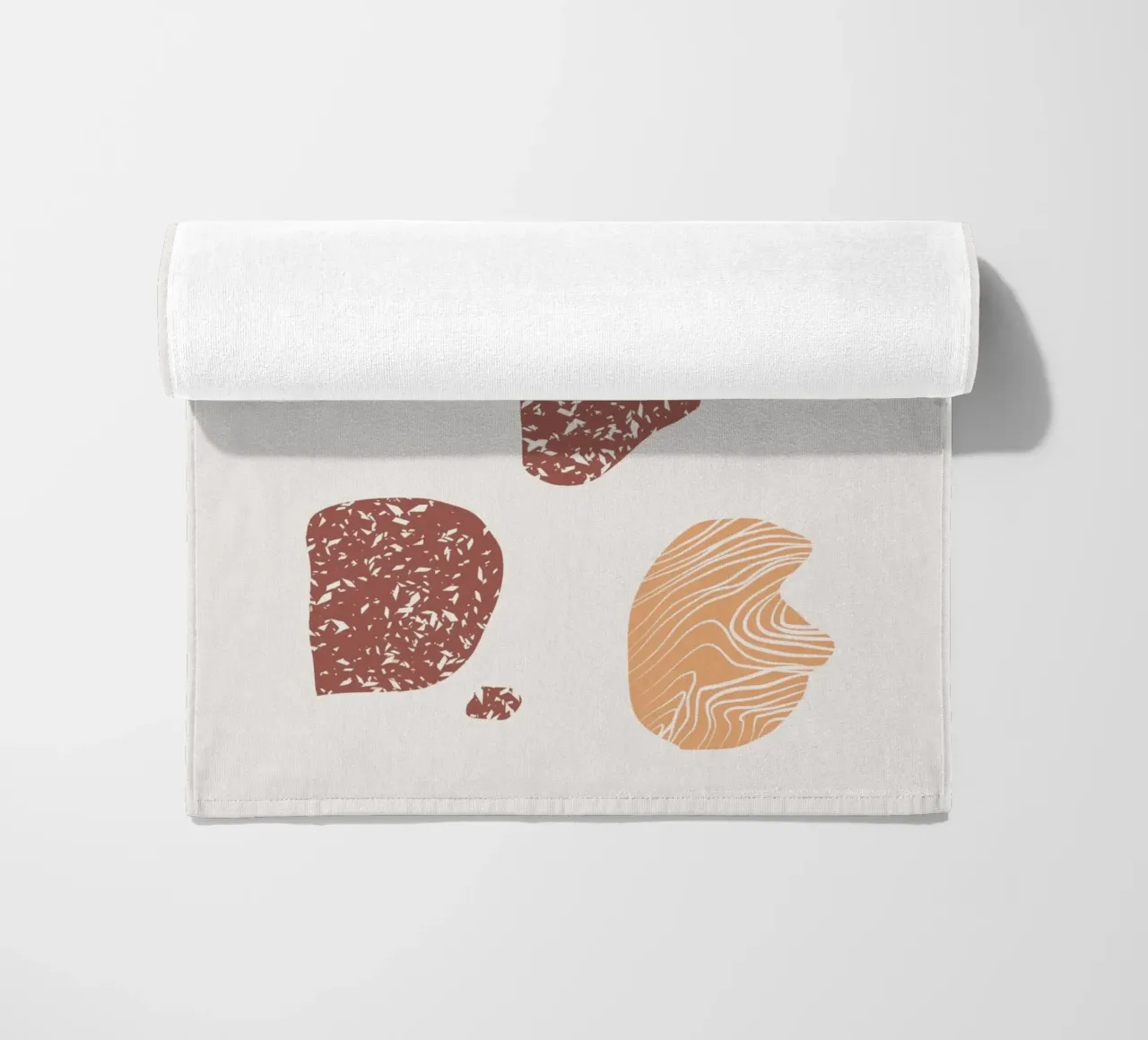 Pebble composition beach towel by Little Dean