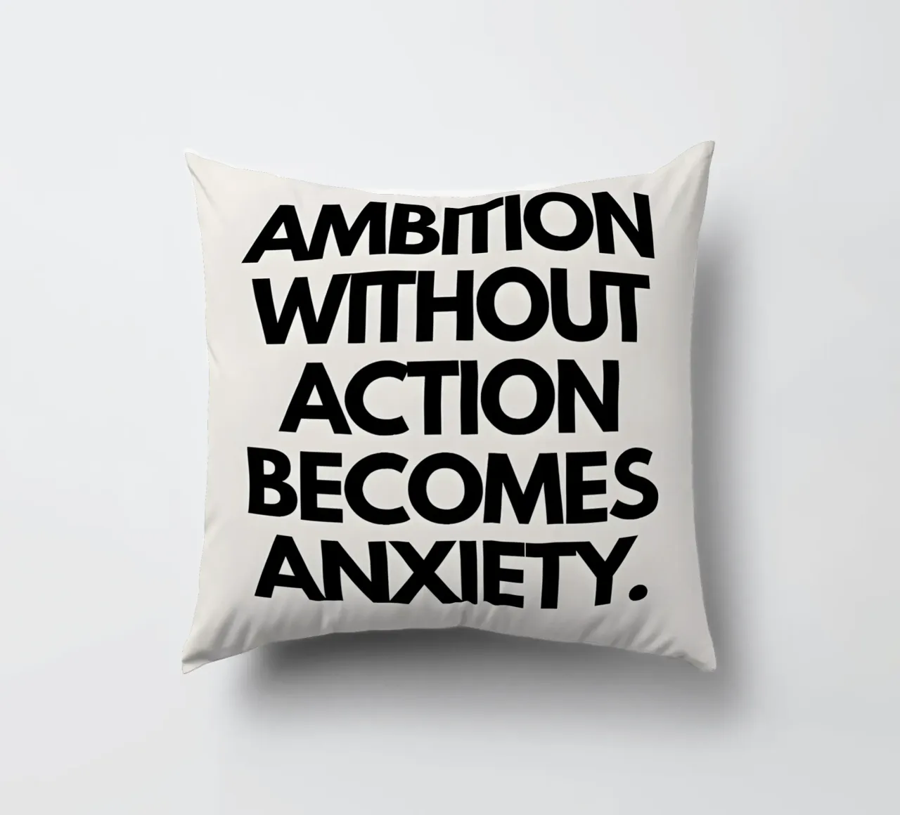 "Ambition without action becomes anxiety." cuscino da Type & Tape