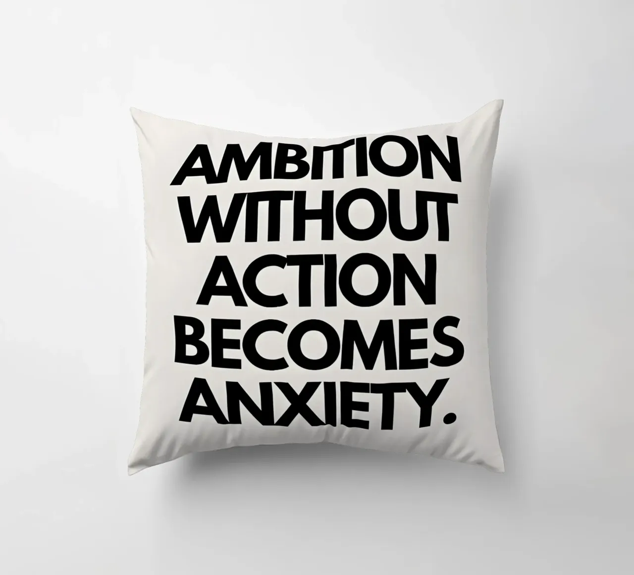 "Ambition without action becomes anxiety." cuscino da Type & Tape