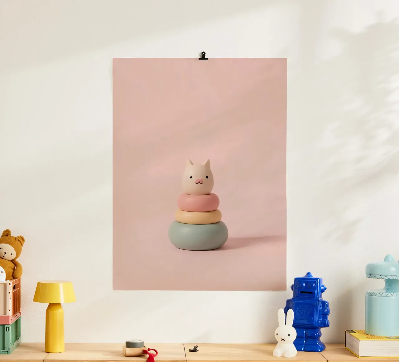 Gatto carino con anello di legno impilato su sfondo rosa poster da DesignDoodle
