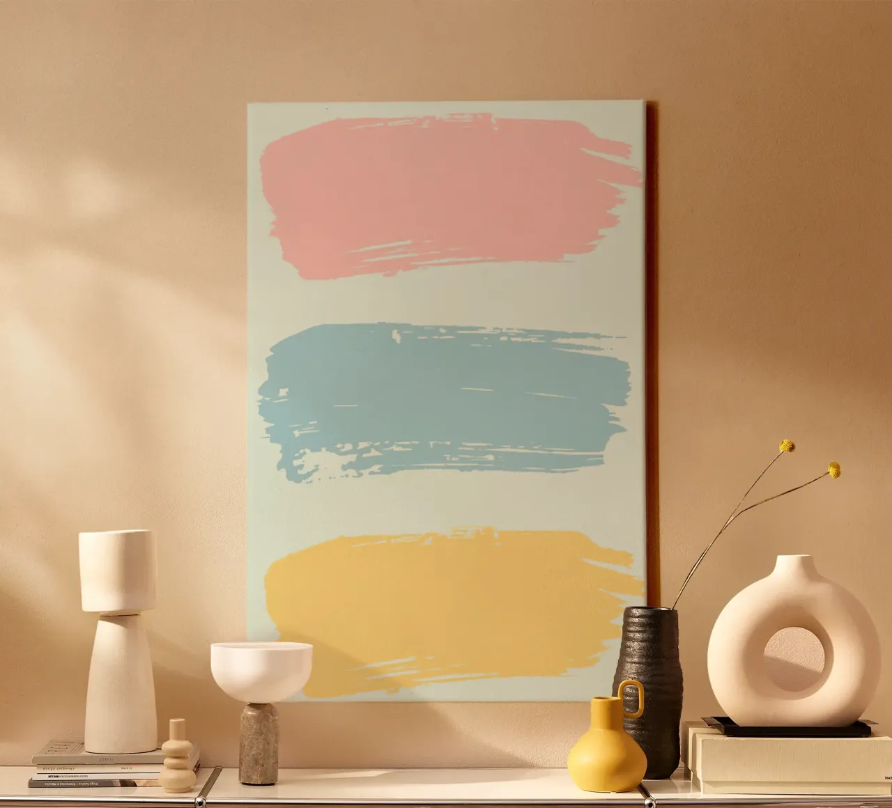Drei farbige Pinselstriche auf pastellfarbenem Hintergrund Leinwand mit Schattenfugenrahmen von DesignDoodle