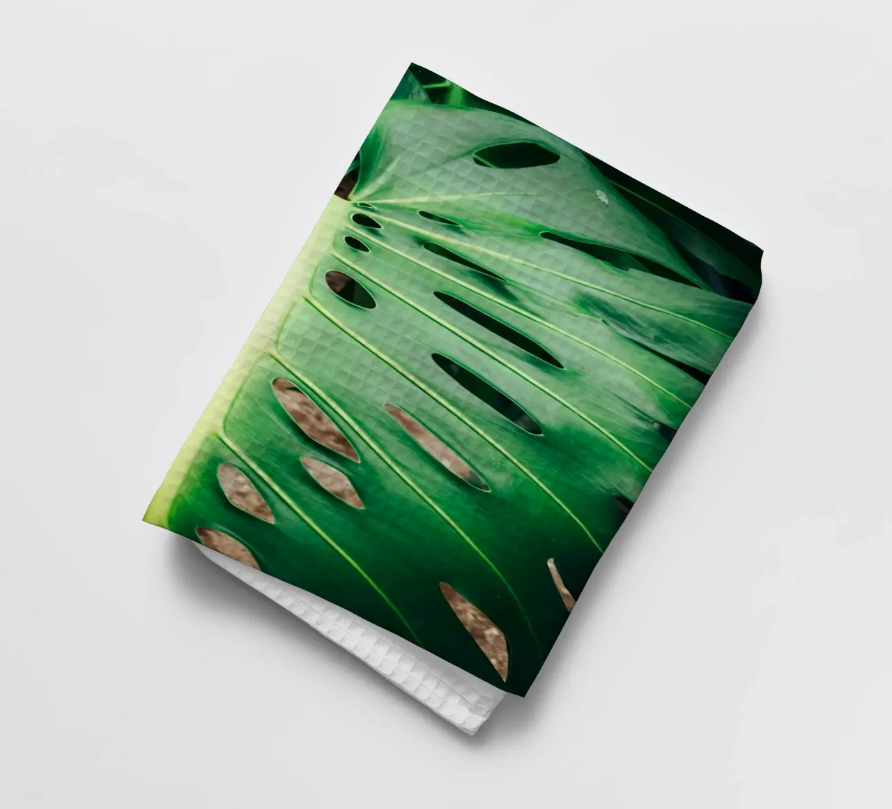 Feuille verte à trous torchon de Earthly Visions