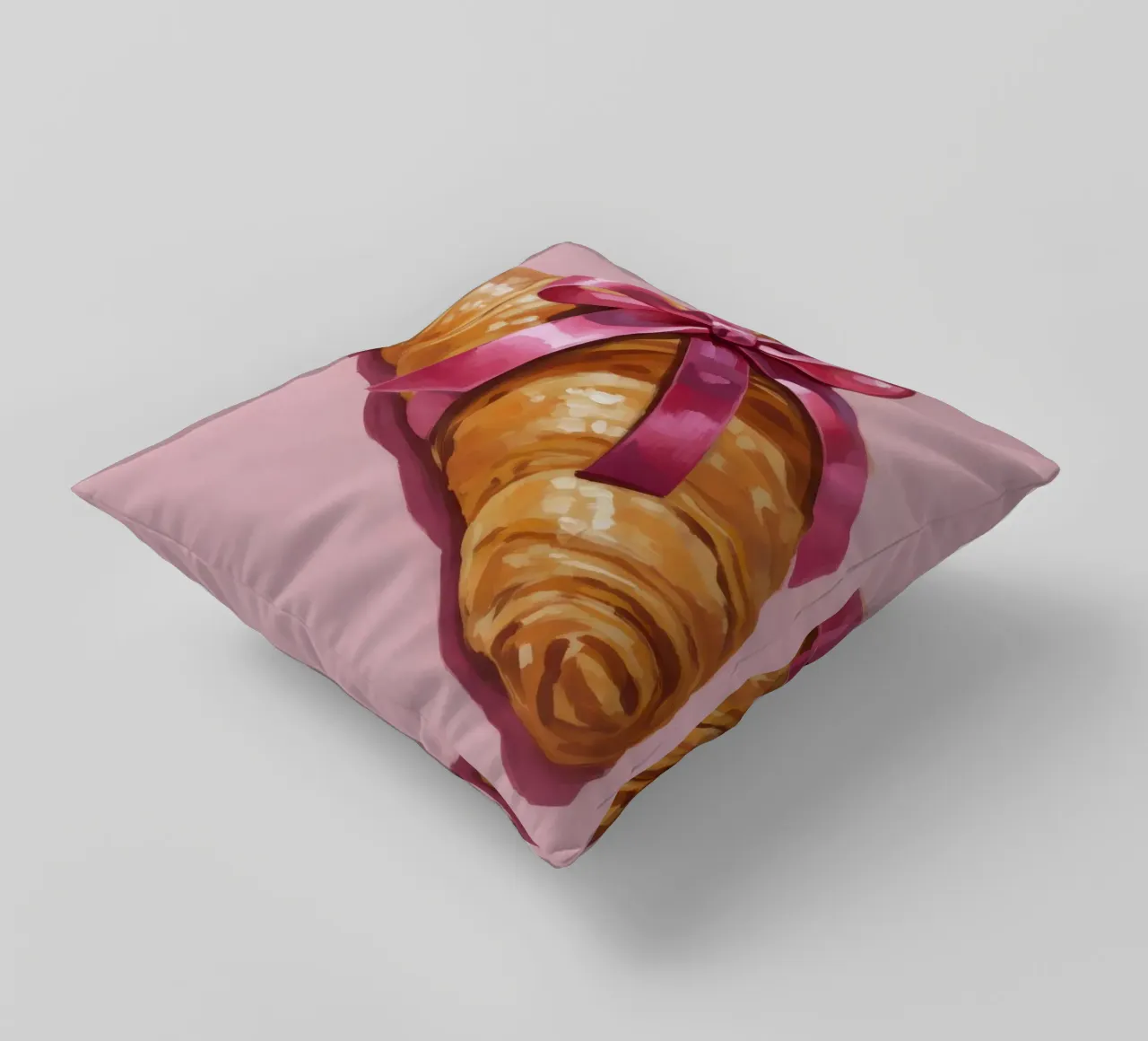 Croissant with Ribbon cuscino da Attaboy Dsgn
