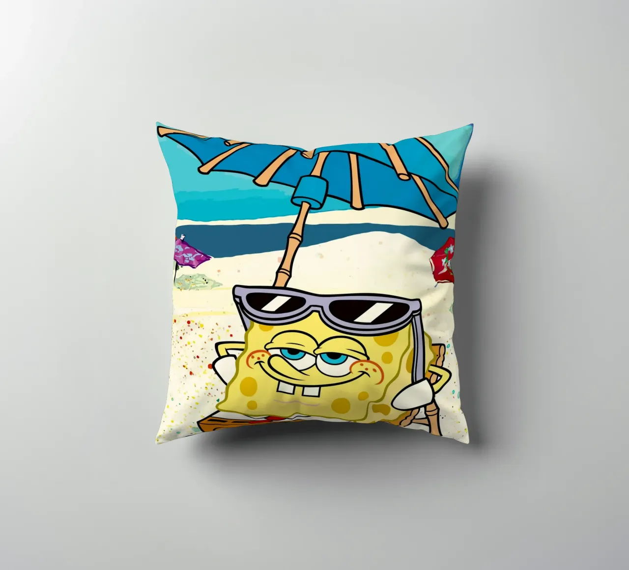 SpongeBob relaxing under an umbrella cuscino da Dumery Art