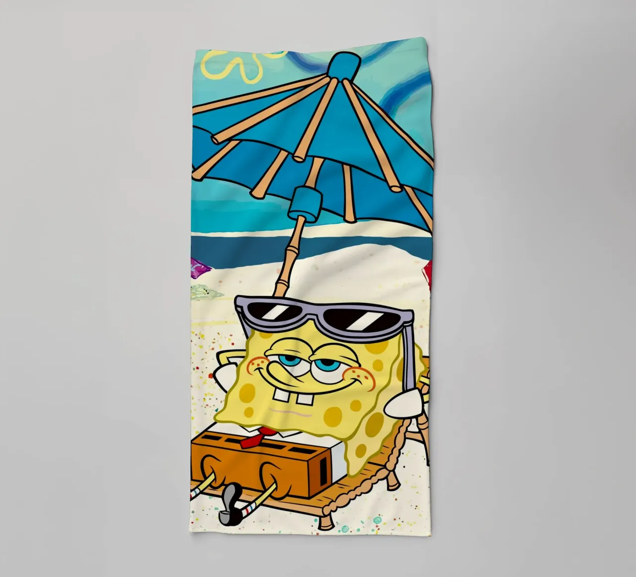 SpongeBob relaxing under an umbrella asciugamano da bagno da Dumery Art