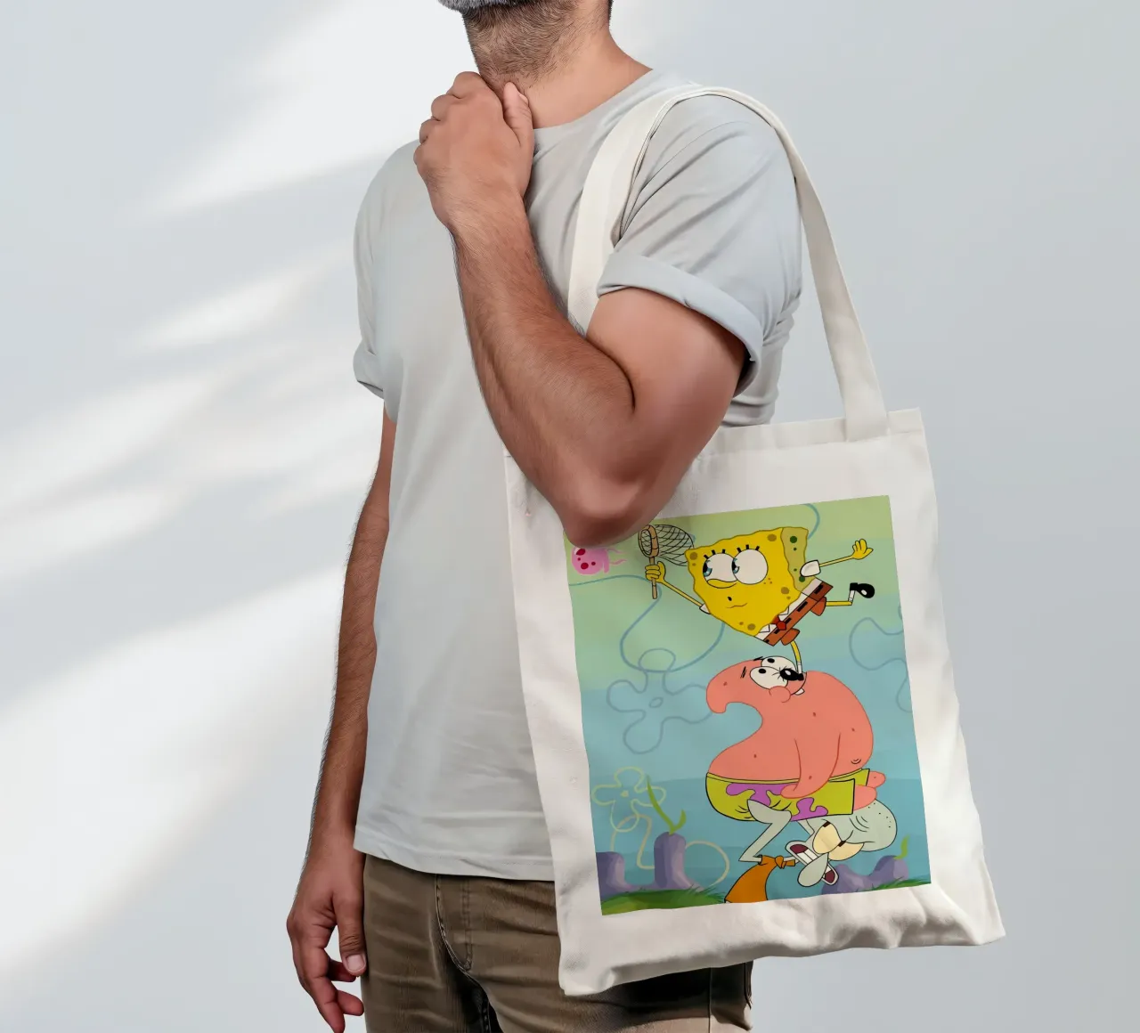SpongeBob, Patrick, and Squidward work together to catch je borsa in juta da Dumery Art