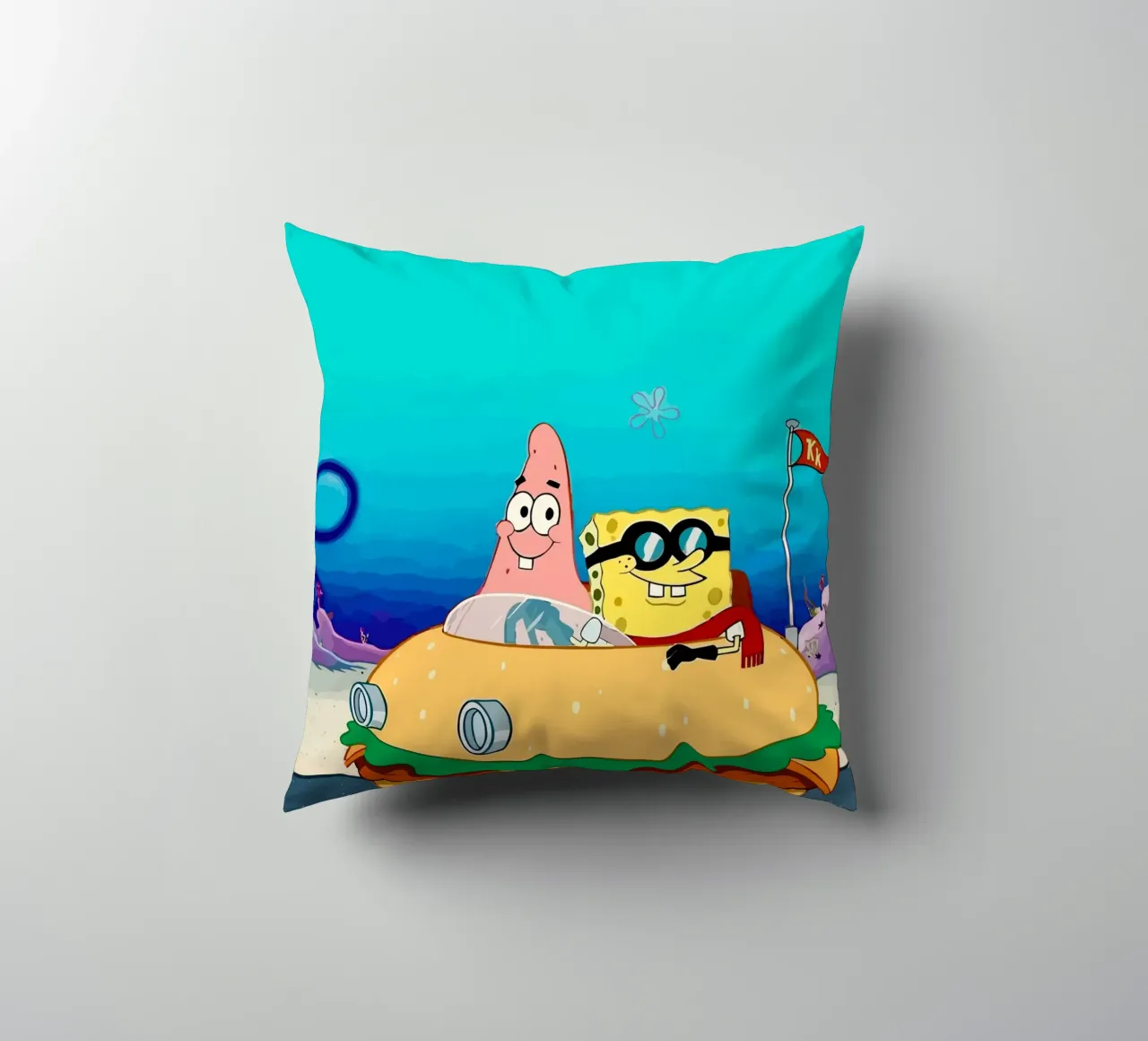SpongeBob and Patrick ride in a burger car cuscino da Dumery Art