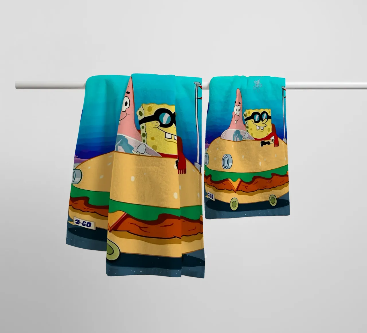 SpongeBob and Patrick ride in a burger car asciugamano da bagno da Dumery Art