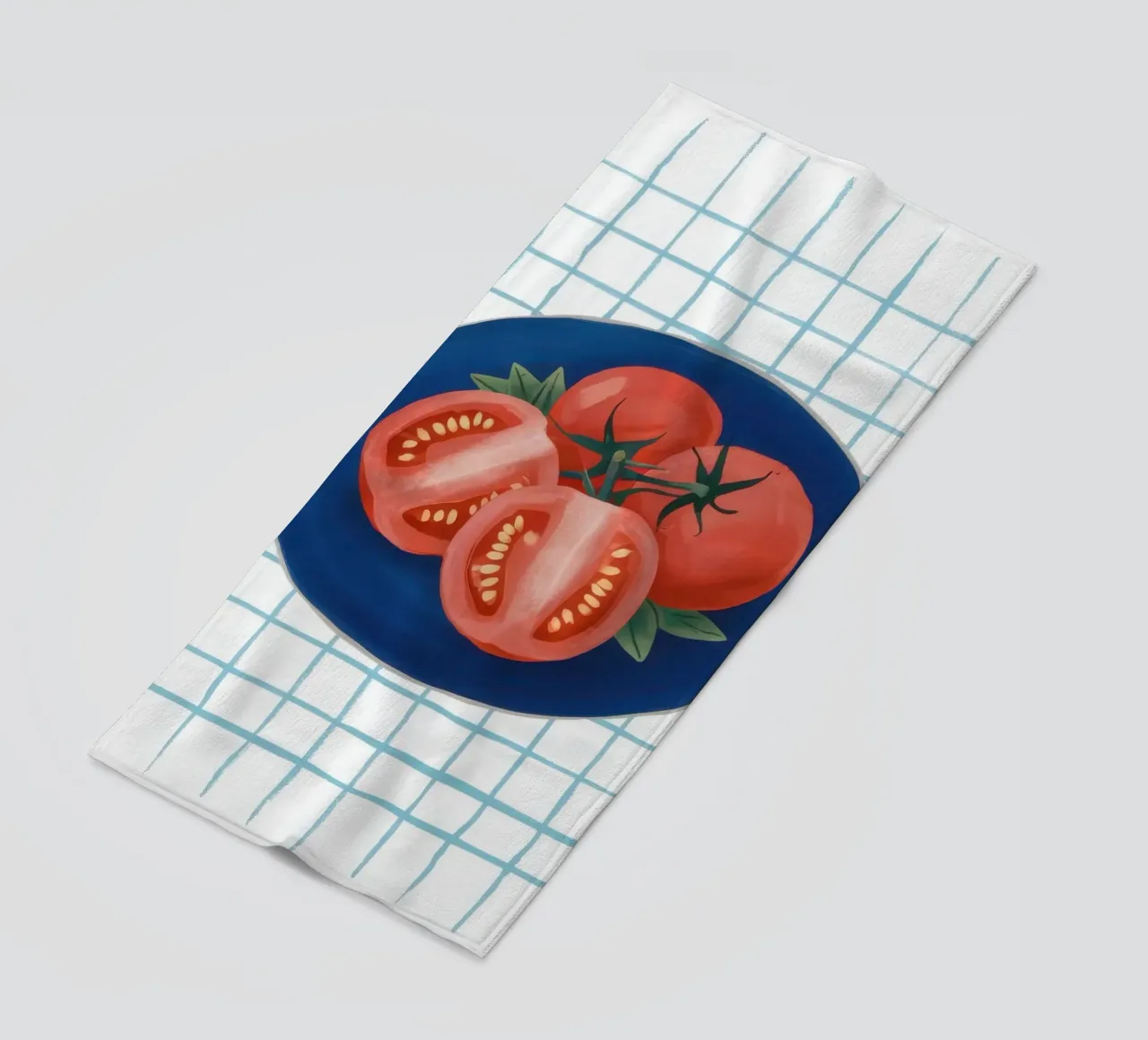 Pomodoro su piatto a scacchi telo mare da Frame Aura
