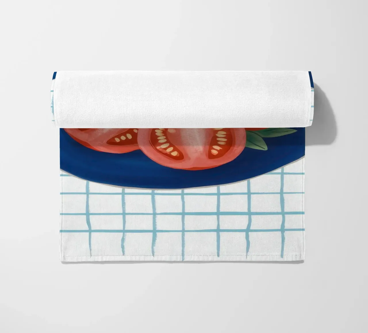 Pomodoro su piatto a scacchi telo mare da Frame Aura