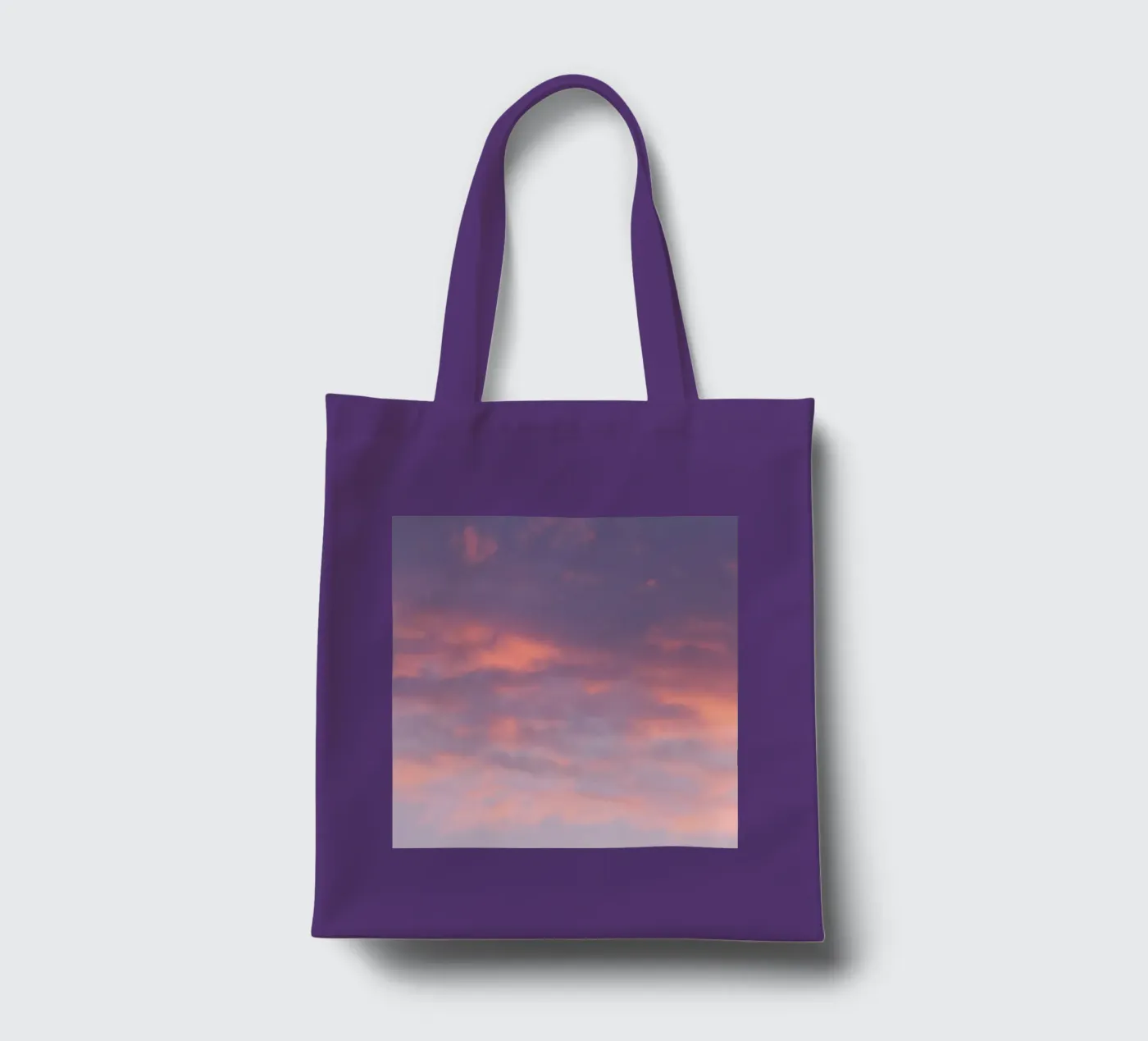 Sunset clouds tote bag by Carol Maia