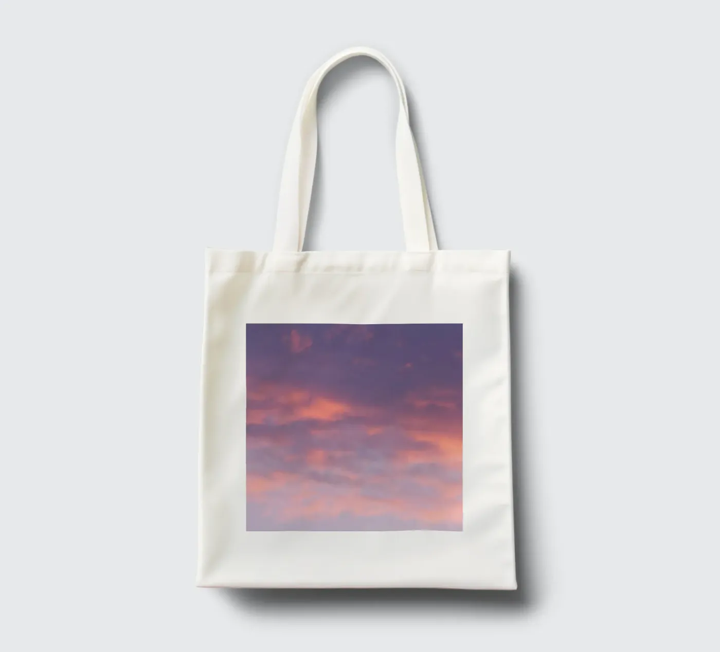 Sunset clouds tote bag by Carol Maia