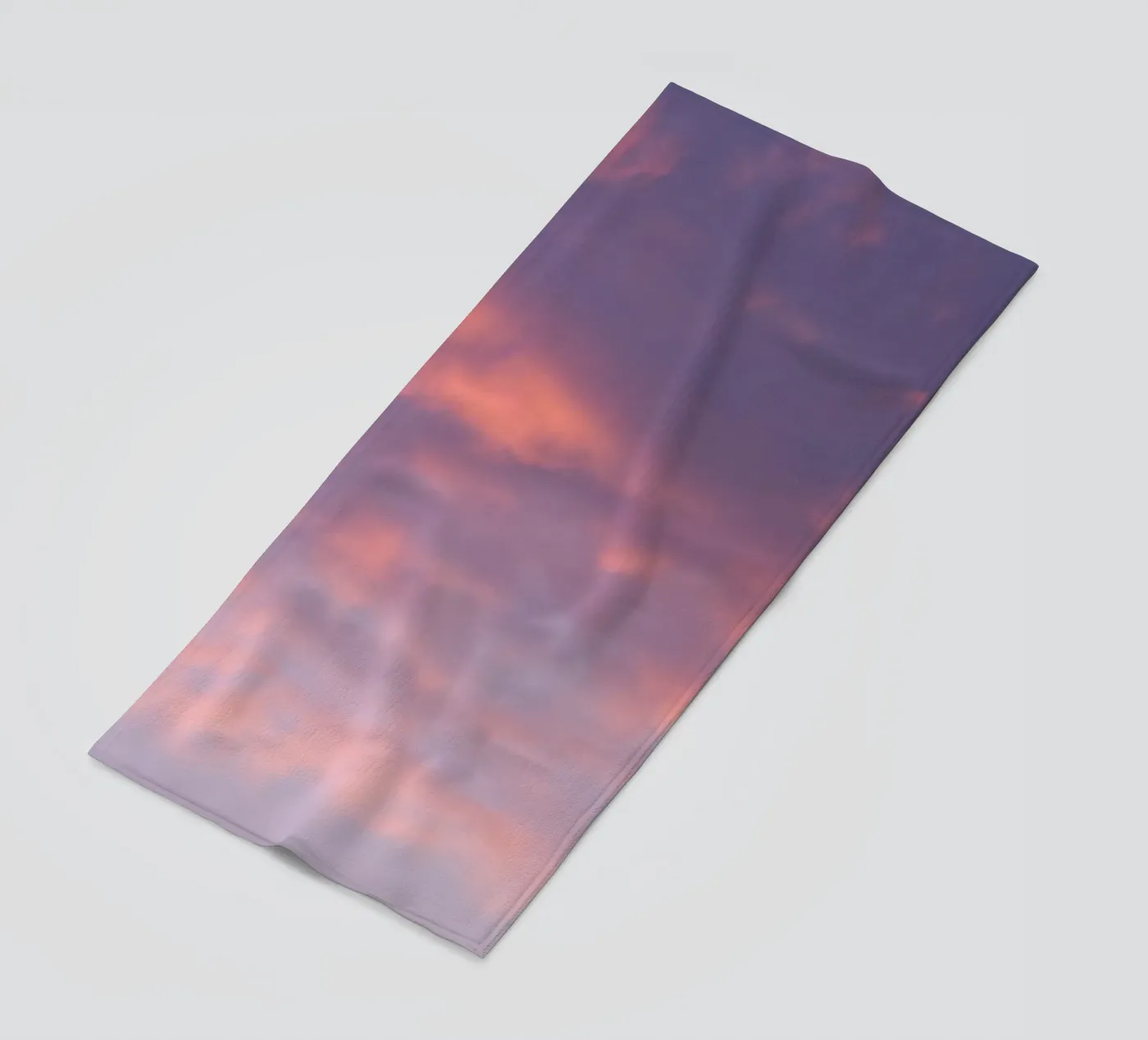 Sunset clouds beach towel by Carol Maia