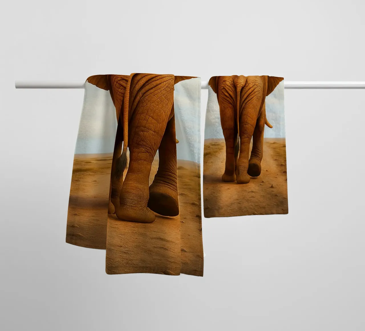 rear view of an elephant walking towel by landtengs