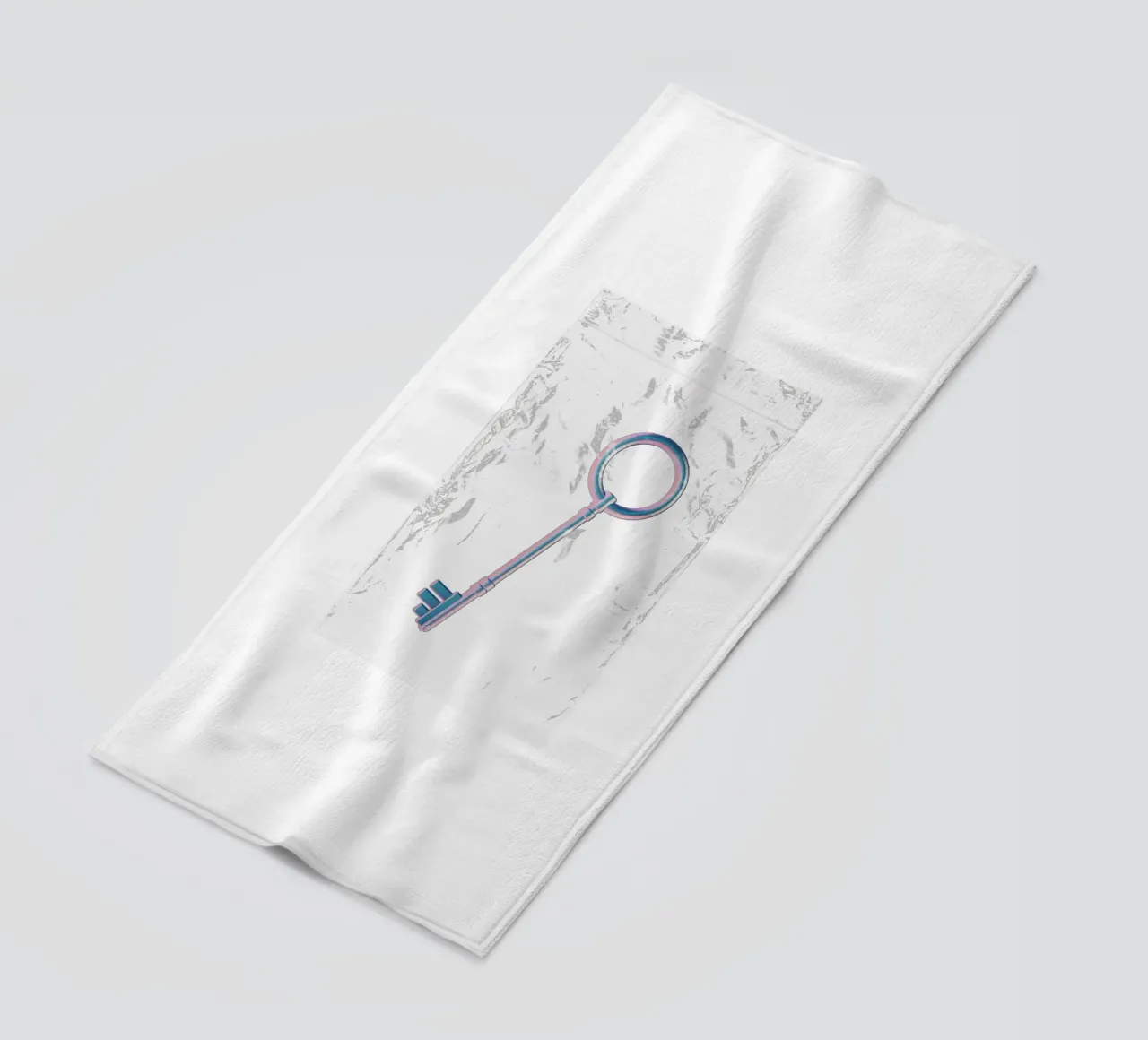 chiave iridescente in un sacchetto di plastica telo mare da morphinaeblue