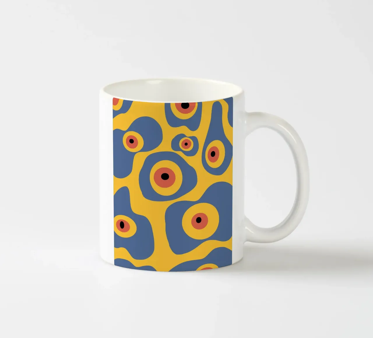 Evil eye pattern ceramic mug by Little Dean