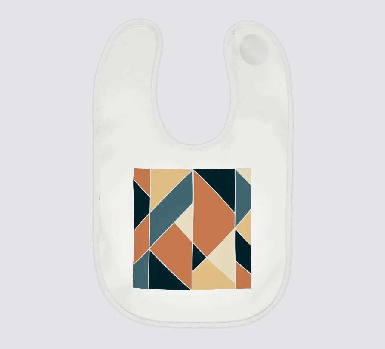 Geometric tile pattern baby bib by Little Dean