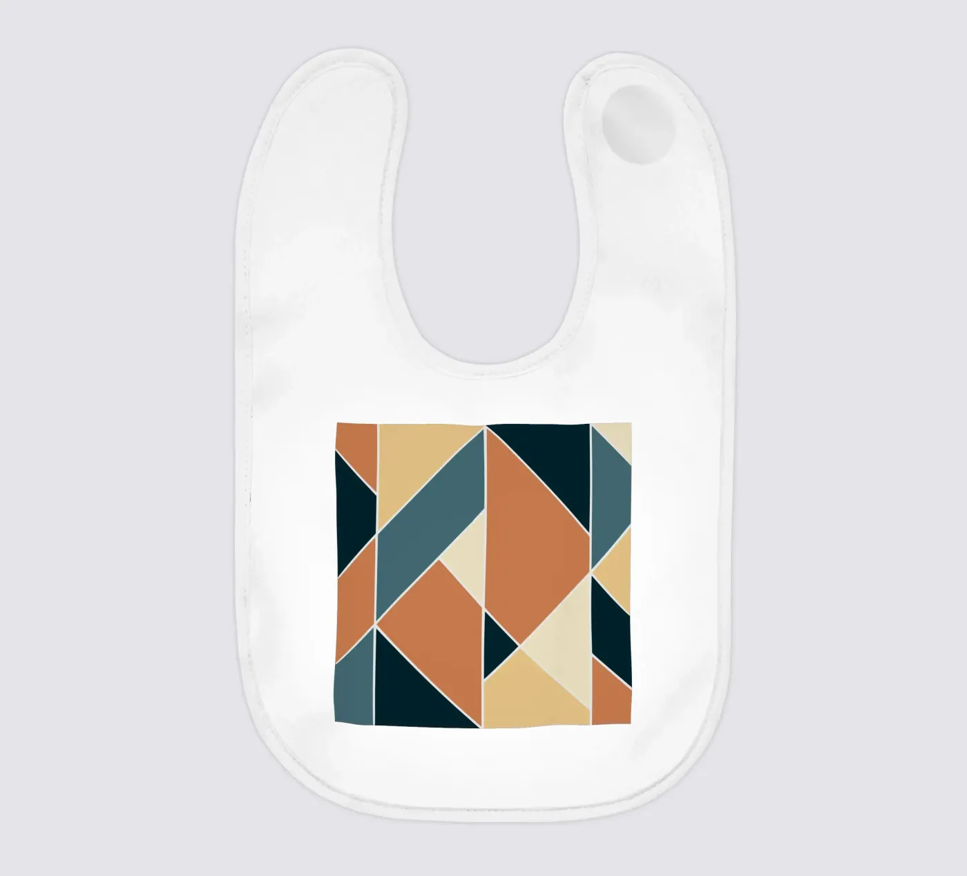 Geometric tile pattern baby bib by Little Dean