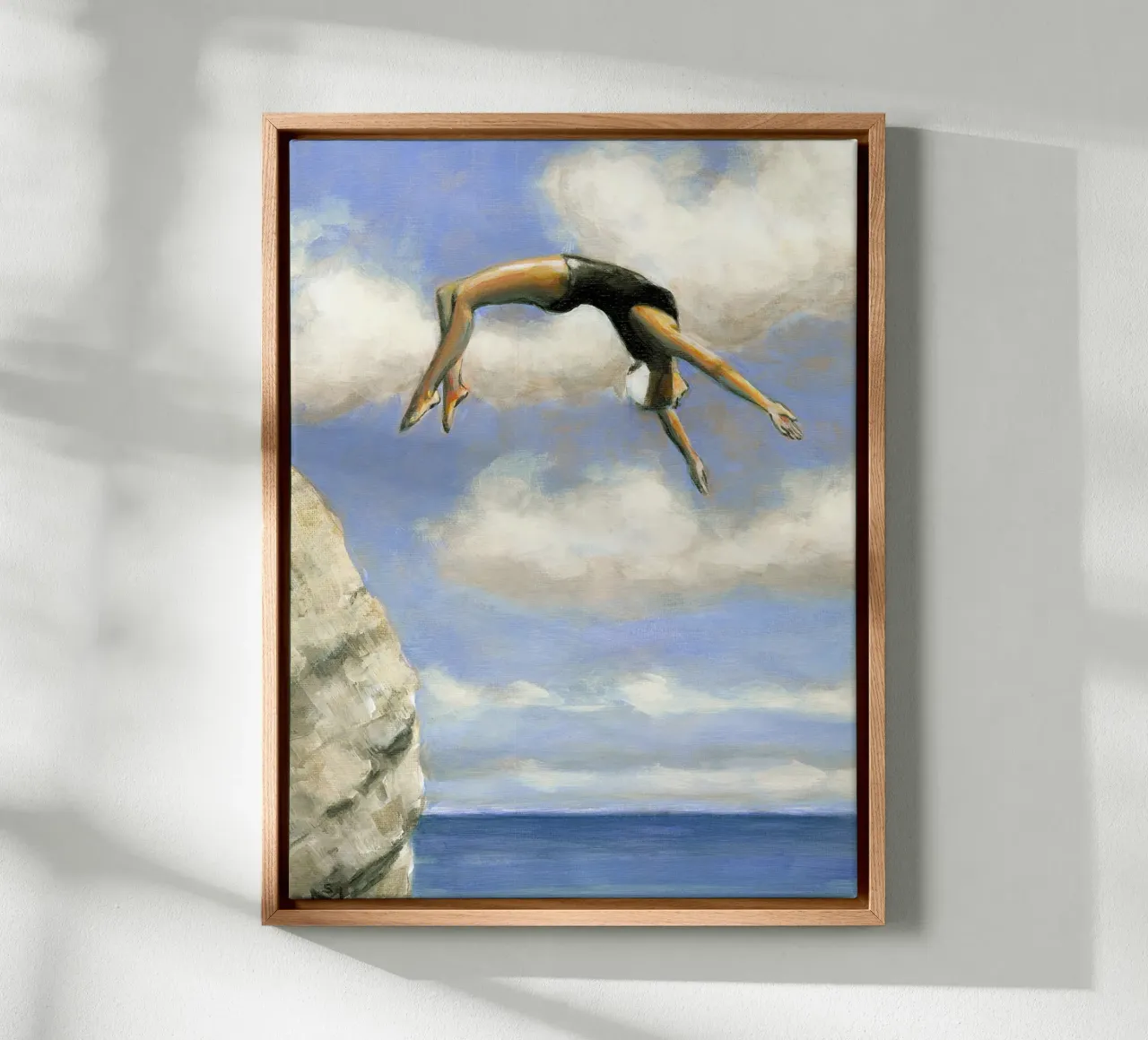 Tauchen von einem Felsen Leinwand mit Schattenfugenrahmen von Wallace